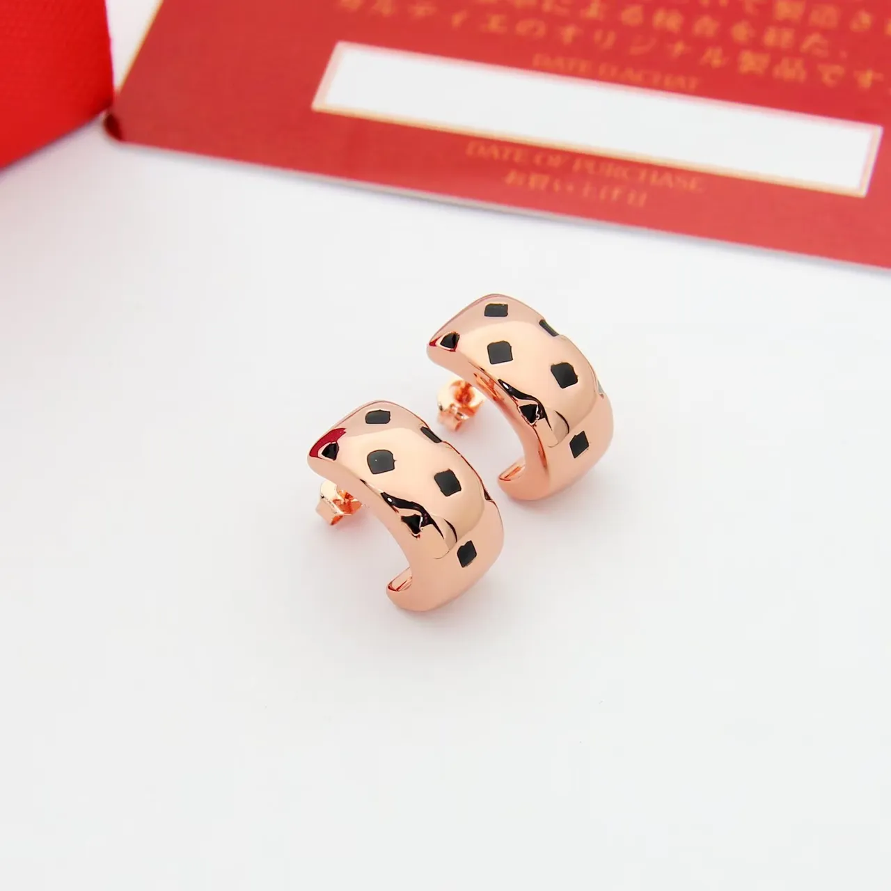 Gold Black Huggie-Style Metallic Earrings 4