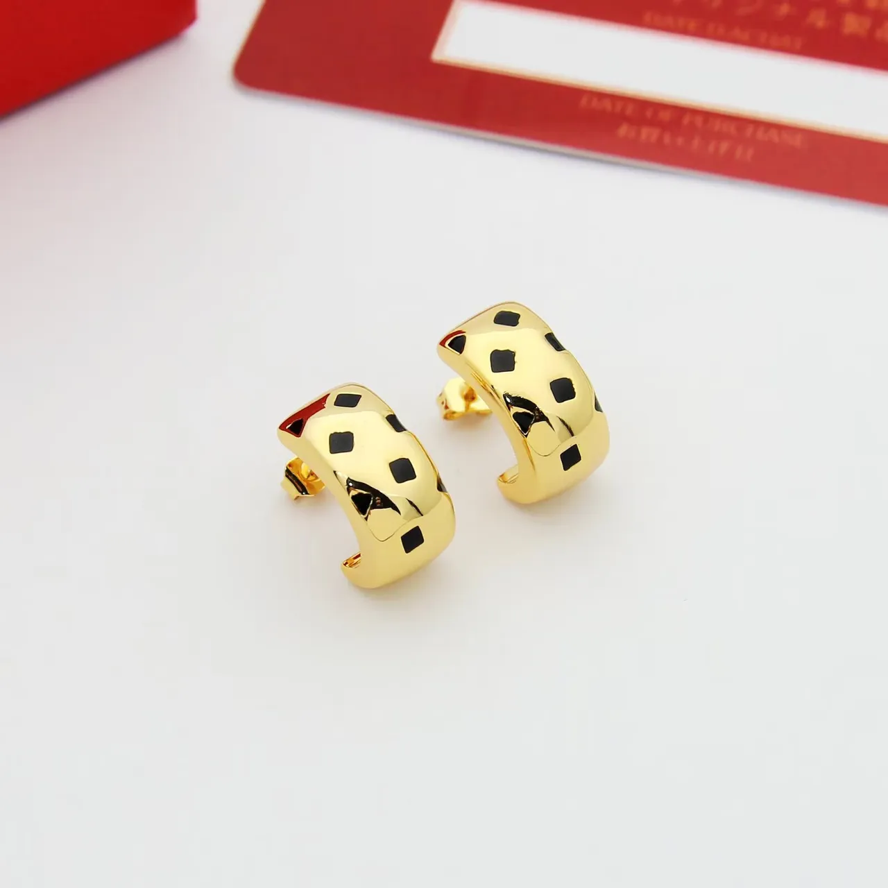 Gold Black Huggie-Style Metallic Earrings 6