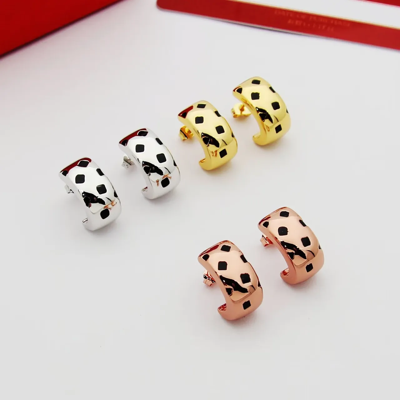 Gold Black Huggie-Style Metallic Earrings 8