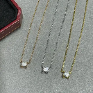 Pendentif or et argent à une pierre avec montage à quatre griffes