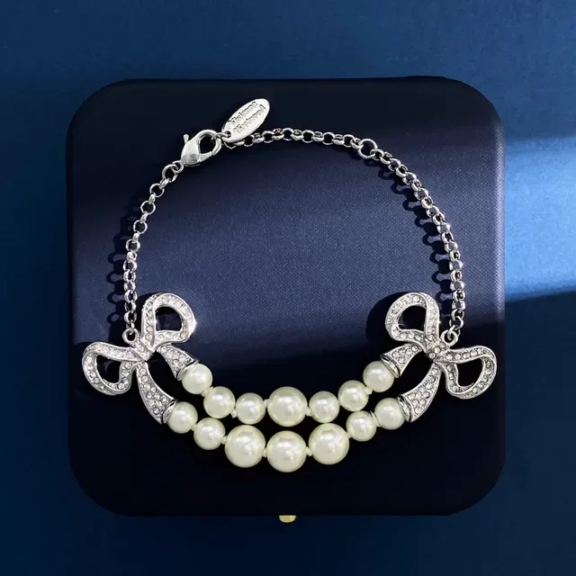 Multi-Strand Pearl and Crystal Bow Necklace 8