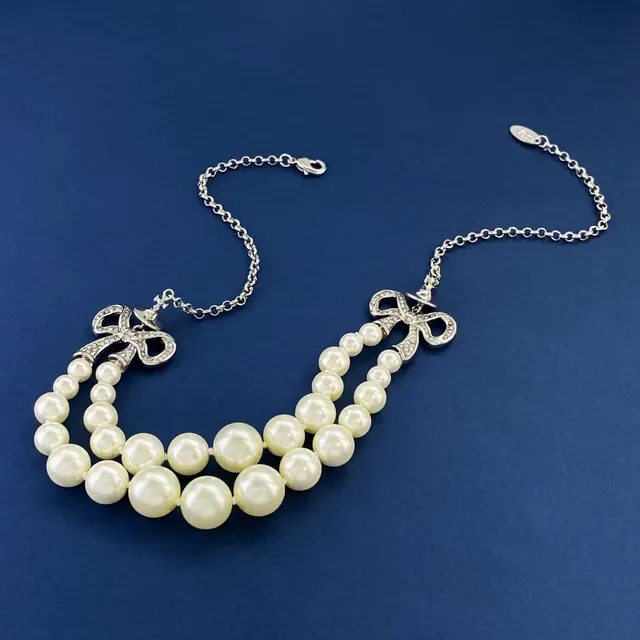 Multi-Strand Pearl and Crystal Bow Necklace 9