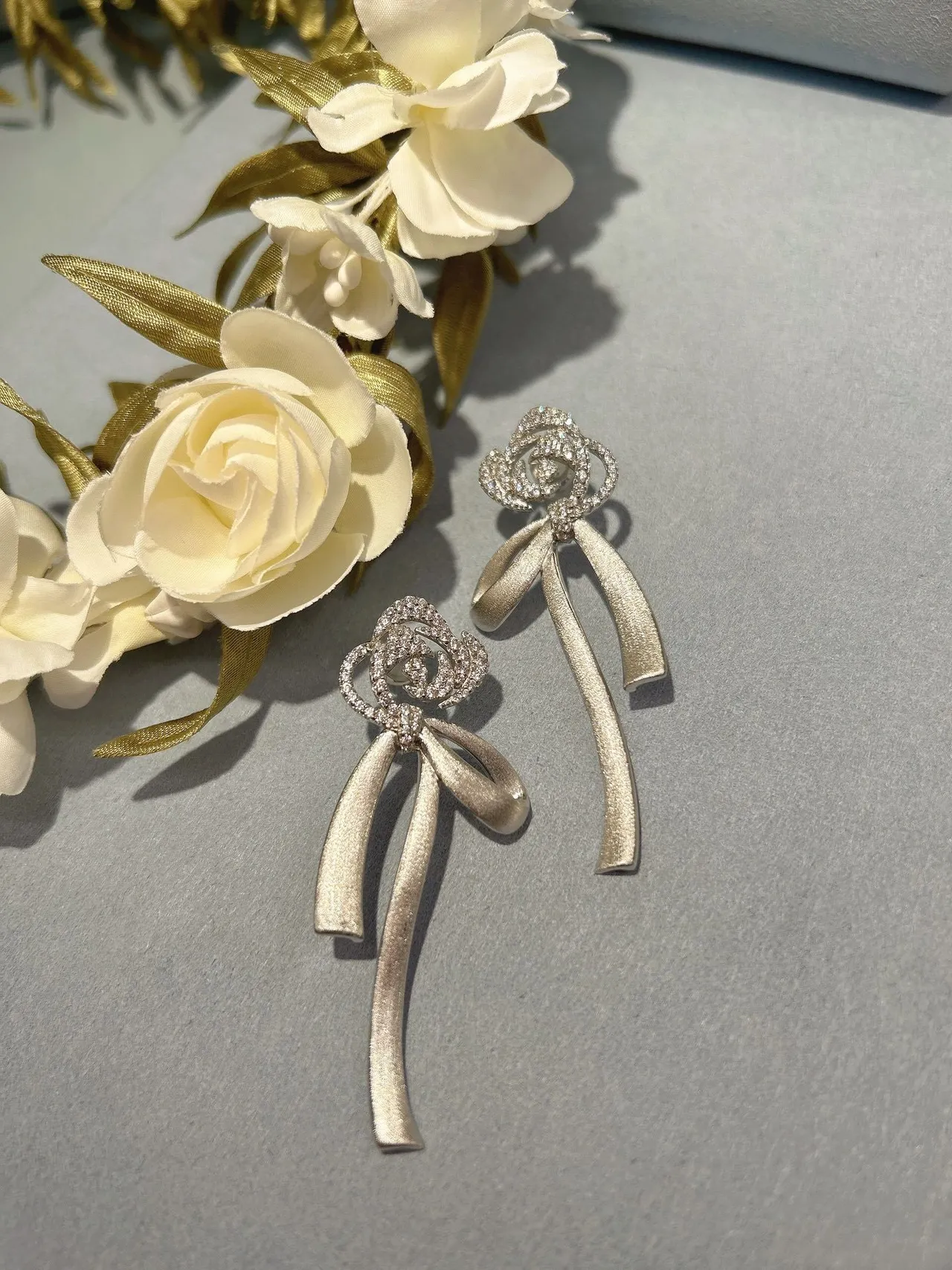 Silver Blue Bow-Shaped Crystal-Embellished Earrings 3
