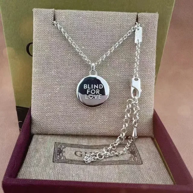 Silver-Toned Engraved Circular Pendant Necklace 7
