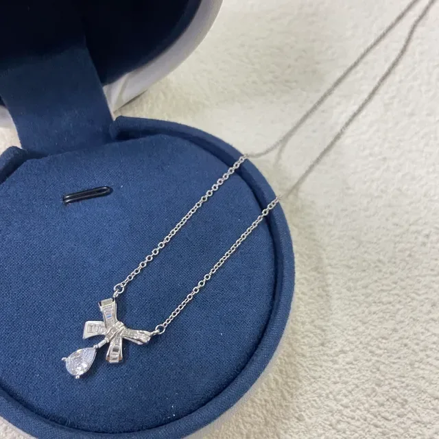 Silver White Bow-Shaped Pendant Baguette-Cut Side Stones Necklace 2