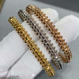 Pulsera de metal con clavijas de pirámide con picos de doble fila