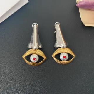 Surrealist Nose and Eye Motif Clip-On Earrings