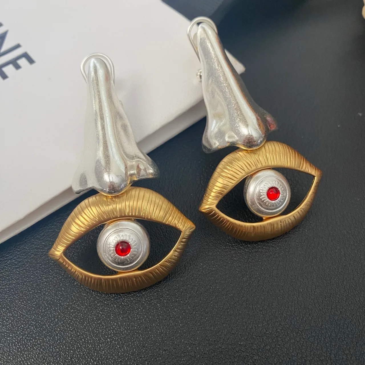 Surrealist Nose and Eye Motif Clip-On Earrings 5
