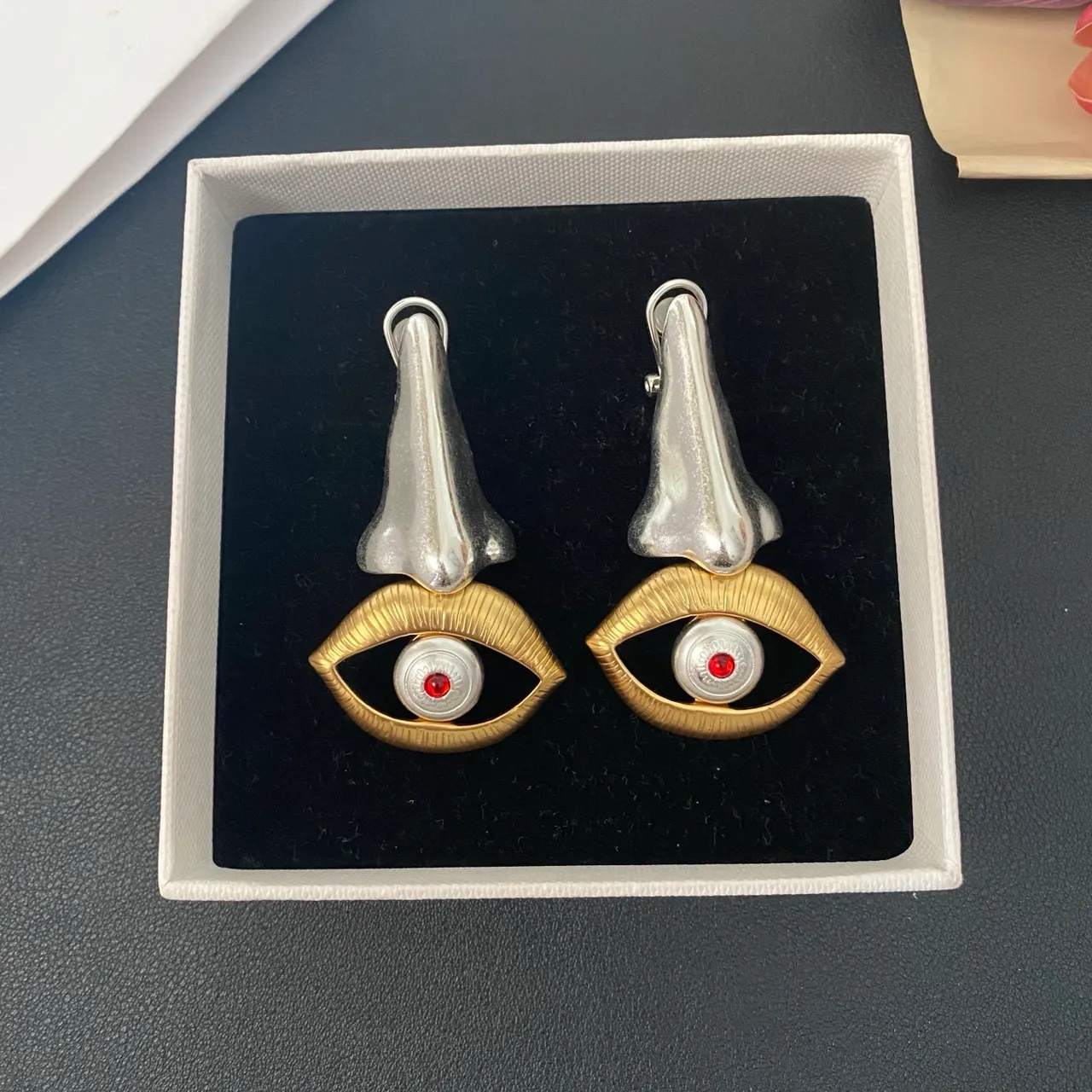 Surrealist Nose and Eye Motif Clip-On Earrings 8
