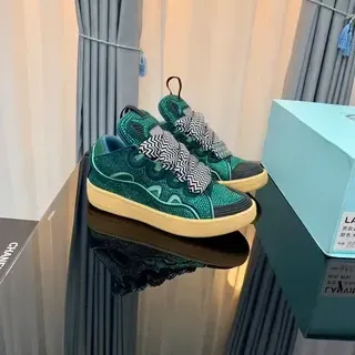 Zapatillas plataforma sin cordones con patrón geométrico en color teal