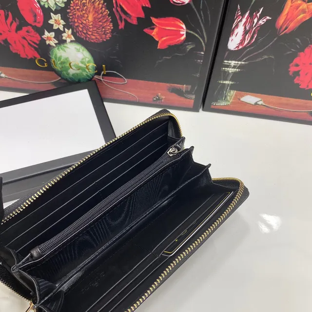 Gucci Portefeuille Long en Cuir Noir et Or avec Monogramme GG Embossé en Cuir Mat 3