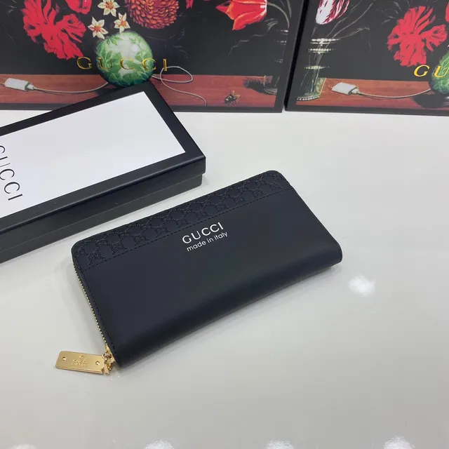 Gucci Portefeuille Long en Cuir Noir et Or avec Monogramme GG Embossé en Cuir Mat 7