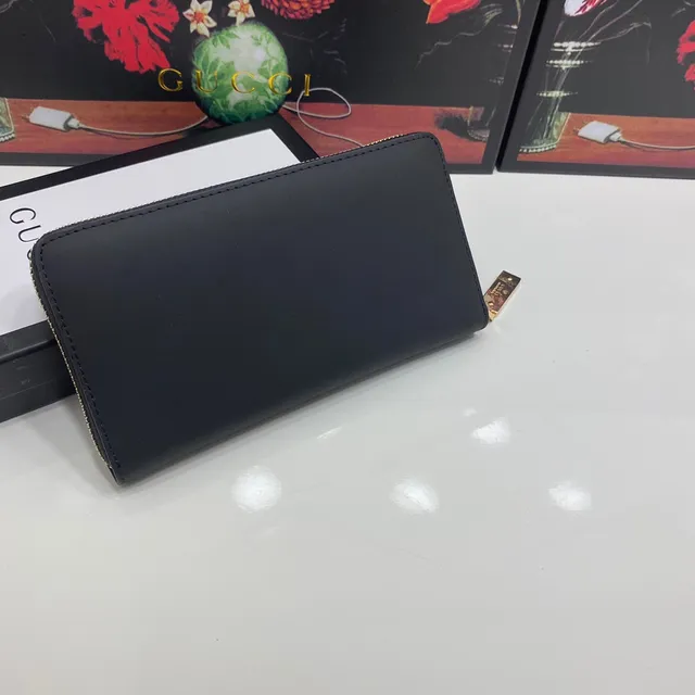 Gucci Portefeuille Long en Cuir Noir et Or avec Monogramme GG Embossé en Cuir Mat 8