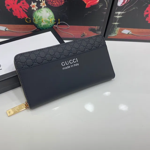 Gucci Portefeuille Long en Cuir Noir et Or avec Monogramme GG Embossé en Cuir Mat 9