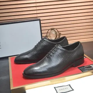 Gucci Black Monogram-Embossed Polished Leather Oxford Shoes