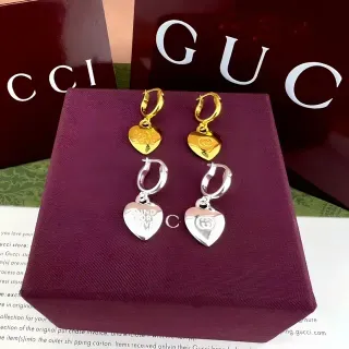 Gucci Blind for Love Gold Silver Heart-Shaped Dangle Earrings