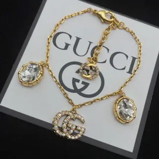 Gucci GG Crystal Triple Charm Gold-Tone Bracelet