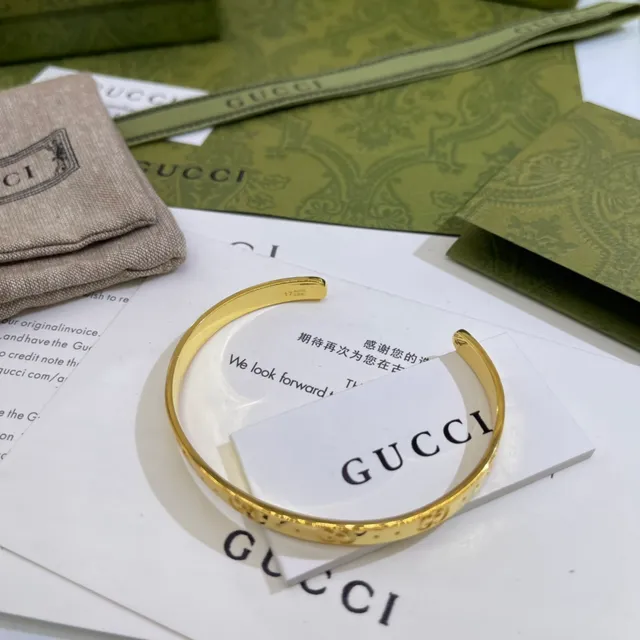 Gucci GG Marmont Engraved Gold and Silver Tone Bracelets 3