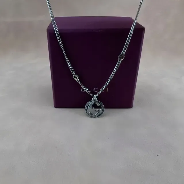 Gucci GG Marmont جي متشابك حبل معلقة 4