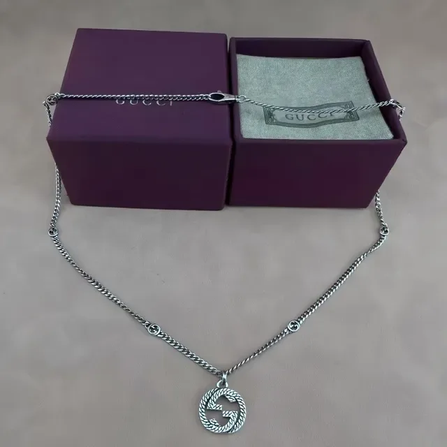 Gucci GG Marmont جي متشابك حبل معلقة 5