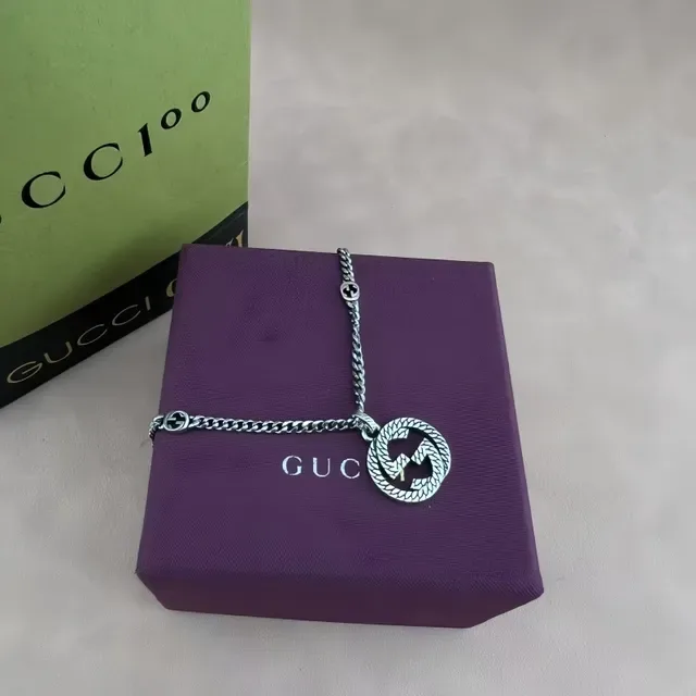 Gucci GG Marmont جي متشابك حبل معلقة 7