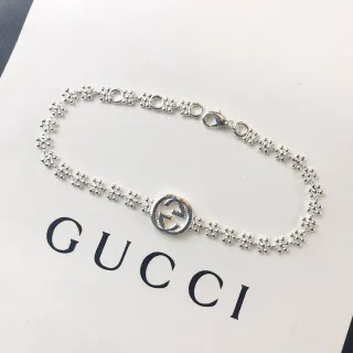 Gucci Pulsera Interlocking G Floral-Link de tono plateado