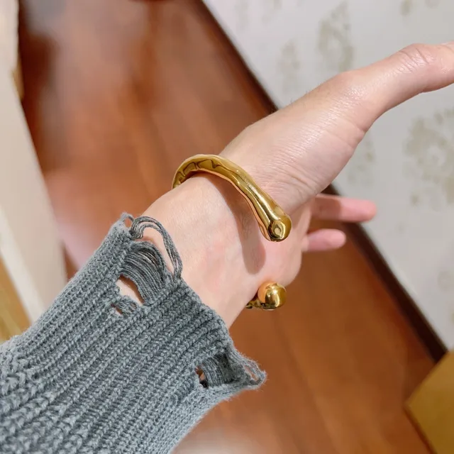 Gucci Sculptural Gold-Tone Open Bangle Bracelet 6