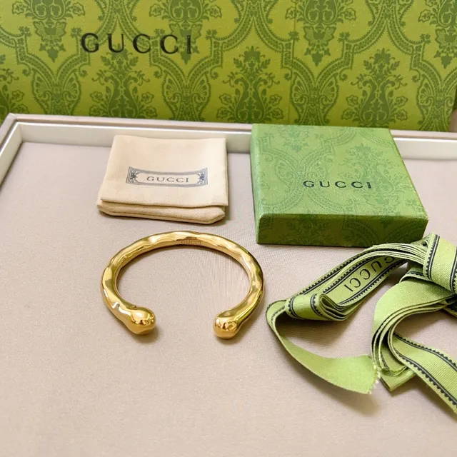 Gucci Sculptural Gold-Tone Open Bangle Bracelet 9