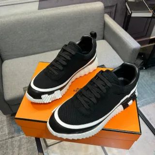 Hermès Tênis preto e branco de malha de suede