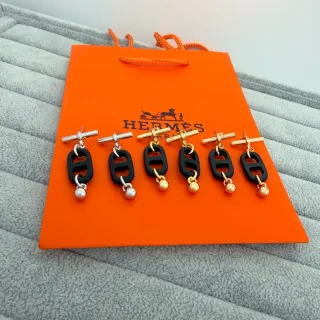 Hermès Black Gold H-Shaped Resin Motif Toggle Closure Earrings