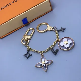 Louis Vuitton Corrente de metal dourado preto pendente multi-encanto montagem joalheria