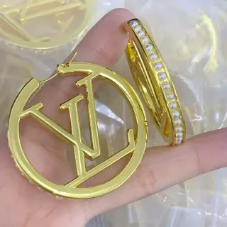 Louis Vuitton Gold White Monogram-Cutout Earrings