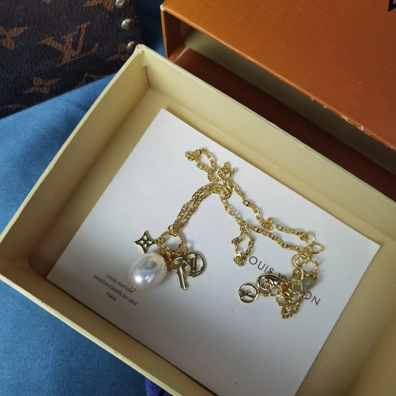Louis Vuitton Gold White Rope Chain Baroque Pearl Pendant Necklace 5