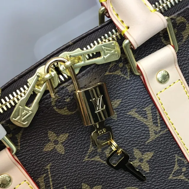 Louis Vuitton Keepall Bandoulière Monogram Canvas Brown and Tan Duffle Bag 6