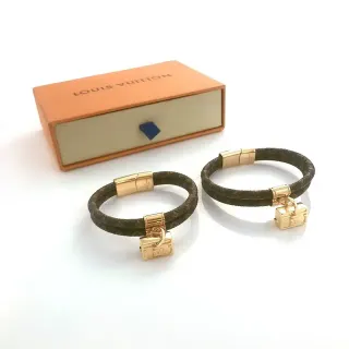 Louis Vuitton Petite Malle سوار جلد مضفر مونوغرام ذهبي اللون