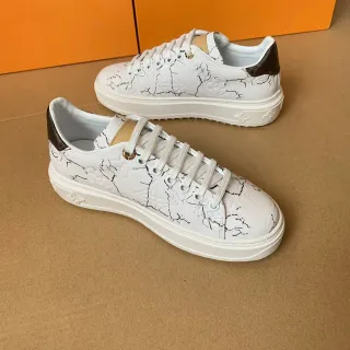 Louis Vuitton huye impresión de mármol zapatillas lifestyle