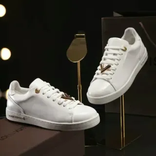 Louis Vuitton Cuero Suave Blanco y Oro LV Twist Hardware Lifestyle Sneakers