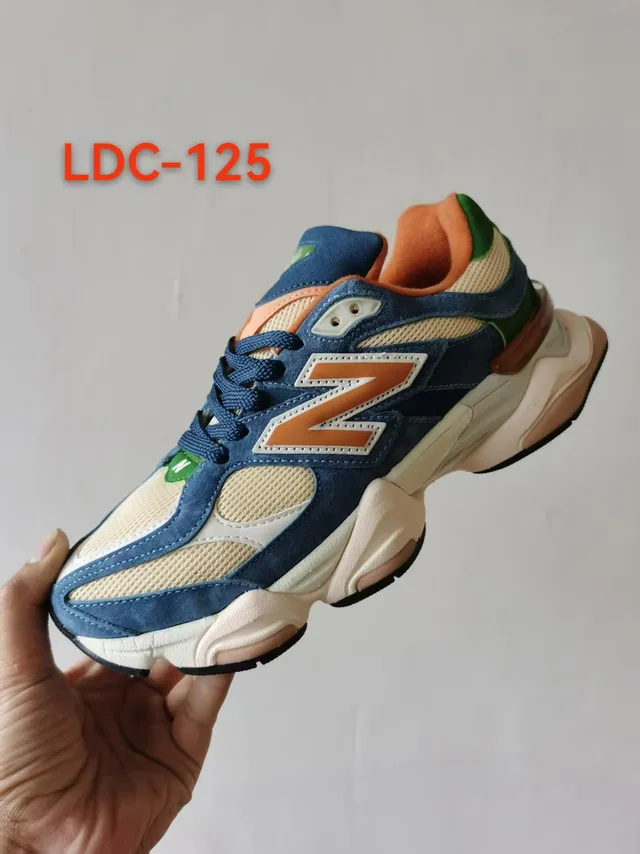 New Balance حذاء رياضي سميك أزرق وبرتقالي وسط طبقي وجزء علوي من الجلد الأصلي والشبكة المختلطة 2
