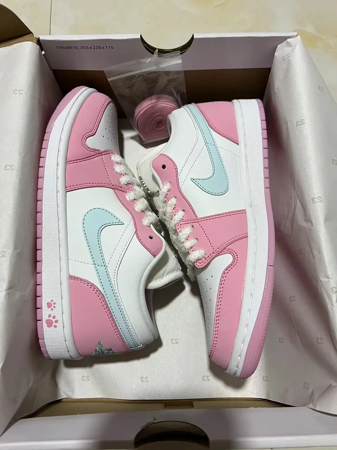 Nike Air Jordan 1 Low Pink and Light Blue Lifestyle Sneakers 9