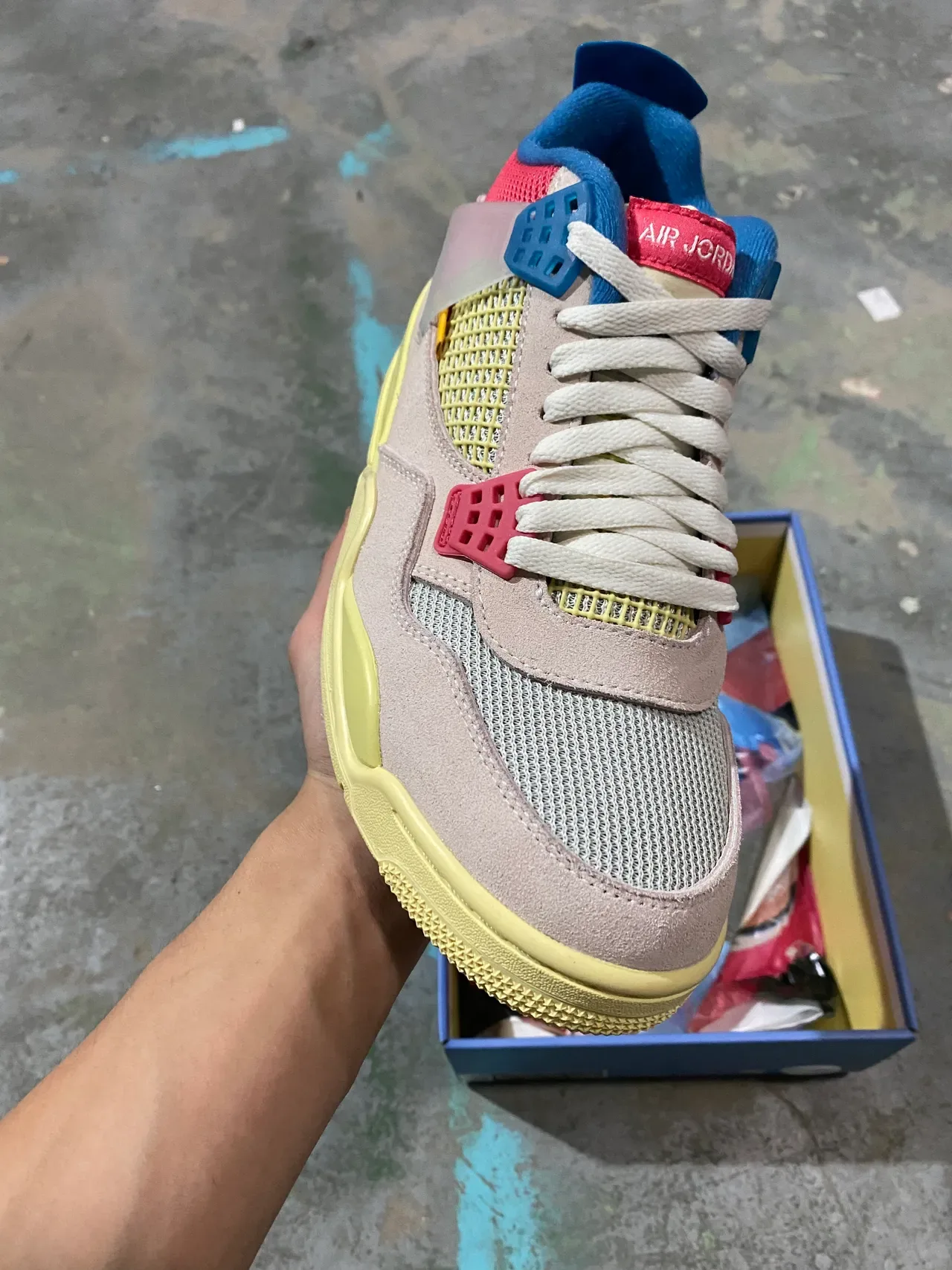 Nike Air Jordan 4 Beige Yellow Red Blue sneakers lifestyle 2