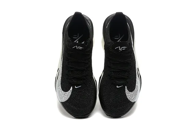 Nike Black Silver Knit Upper Asymmetric Sculpted Midsole Running Shoes 2