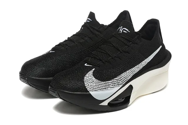Nike Black Silver Knit Upper Asymmetric Sculpted Midsole Running Shoes 4