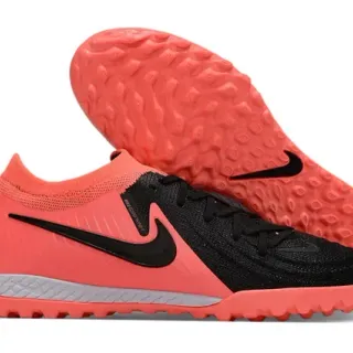 Nike Gripknit Zapatillas de fútbol turf naranja y negro de corte bajo con upper de tejido y overlay lateral sintético