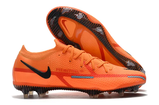 Nike Chaussures de football à empeigne tricotée orange et noir, col avec ajustement dynamique et sol ferme 2