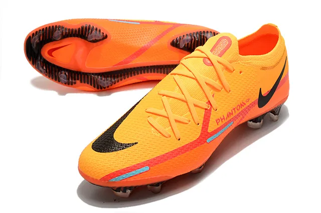 Nike Chaussures de football à empeigne tricotée orange et noir, col avec ajustement dynamique et sol ferme 7
