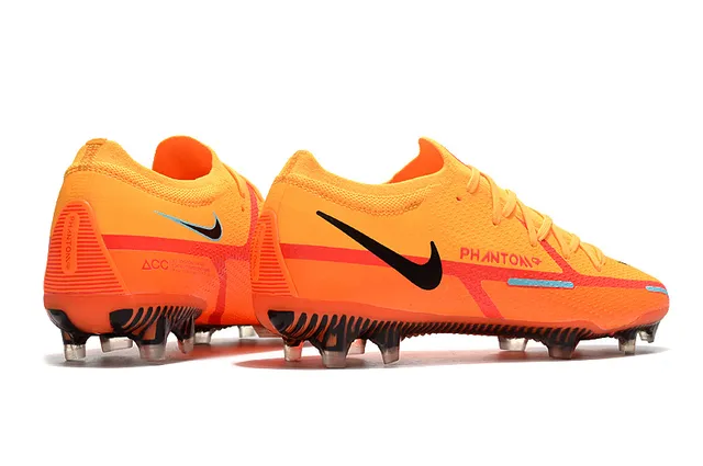 Nike Chaussures de football à empeigne tricotée orange et noir, col avec ajustement dynamique et sol ferme 8