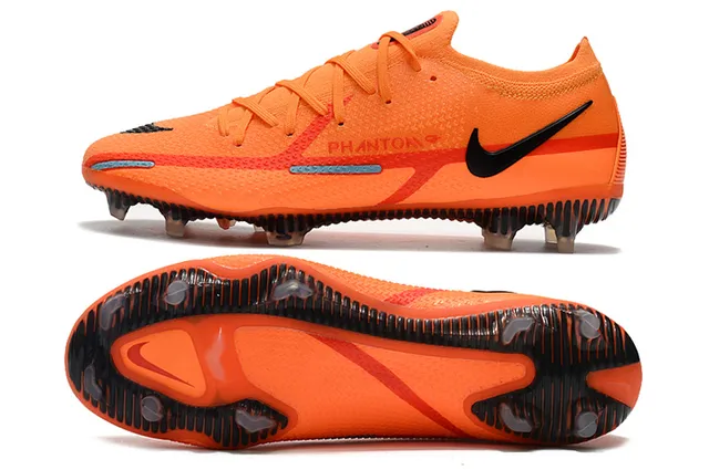Nike Chaussures de football à empeigne tricotée orange et noir, col avec ajustement dynamique et sol ferme 9