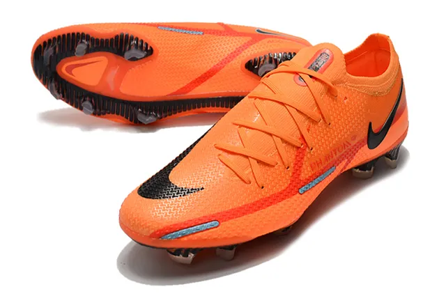 Nike Chaussures de football à empeigne tricotée orange et noir, col avec ajustement dynamique et sol ferme 13