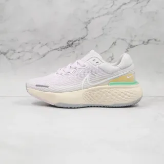 Nike Chaussures de course à tige en maille rose beige, semelle intermédiaire en mousse sculptée