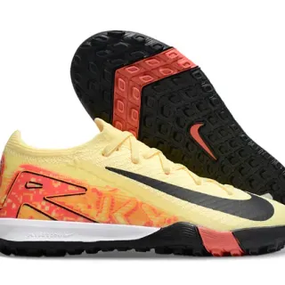 Zapatillas de fútbol Nike con upper de knit amarillo-naranja, overlay gráfico gradient, turf